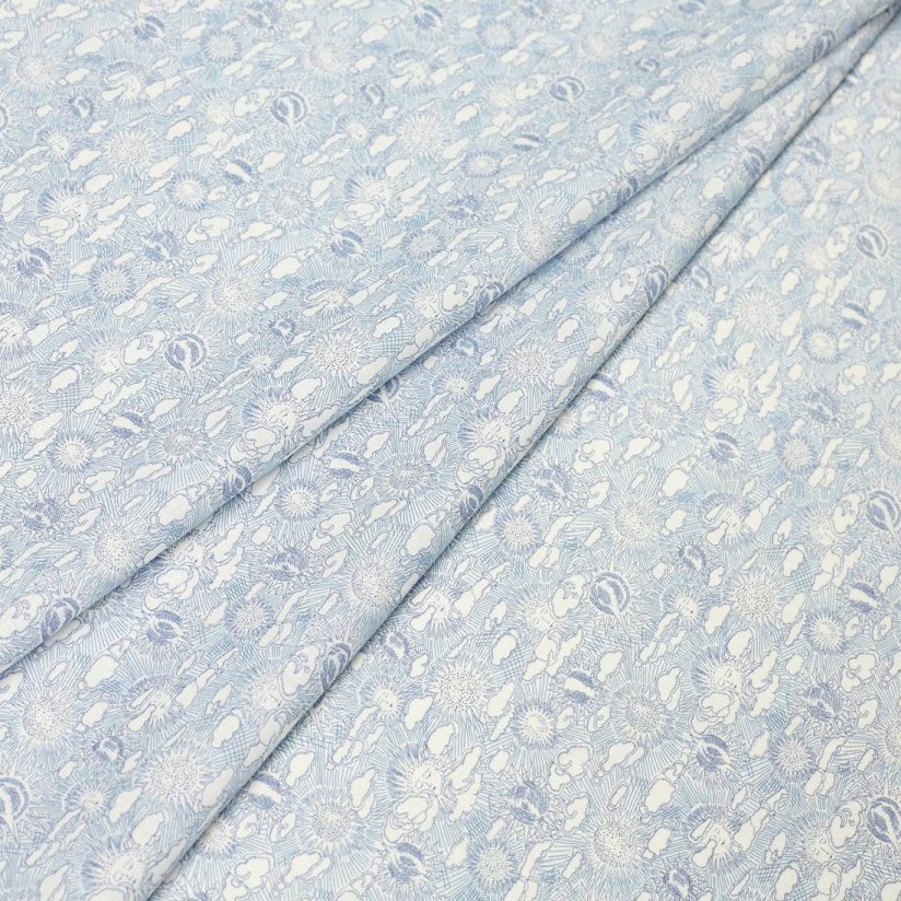 Ткань из смеси льна и хлопка. Принт «Sunbeam canvas» (Картина с солнечными лучами) выполнен в бело-голубых тонах в наличии