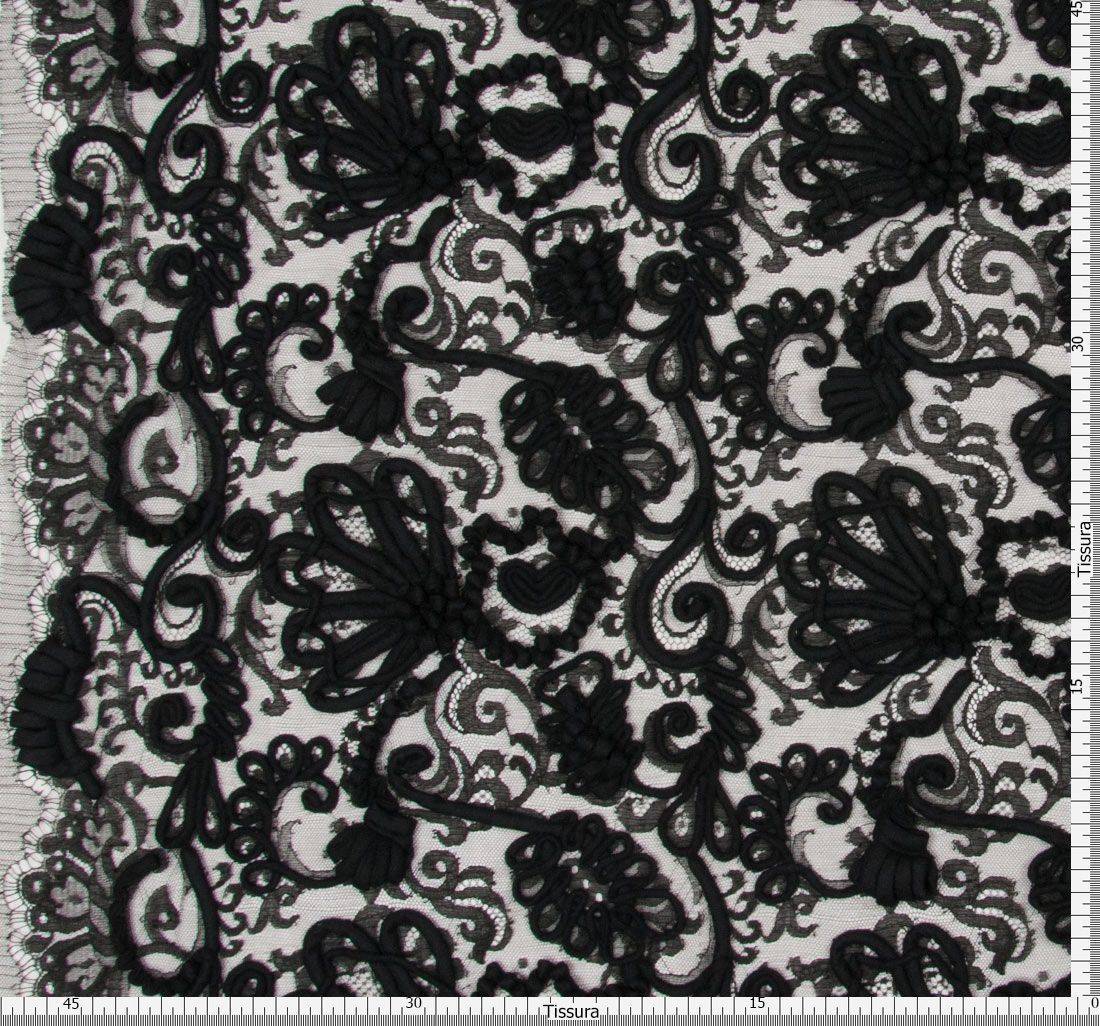 Ткань Кружево расшитое шнуром из полиамида Основа: кружево из искусственного шелка Цвет: черный. Цвет отделочного шнура: черный в наличии