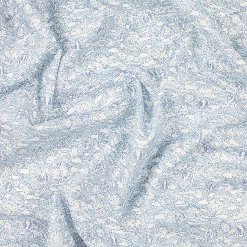 Ткань из смеси льна и хлопка. Принт «Sunbeam canvas» (Картина с солнечными лучами) выполнен в бело-голубых тонах в наличии