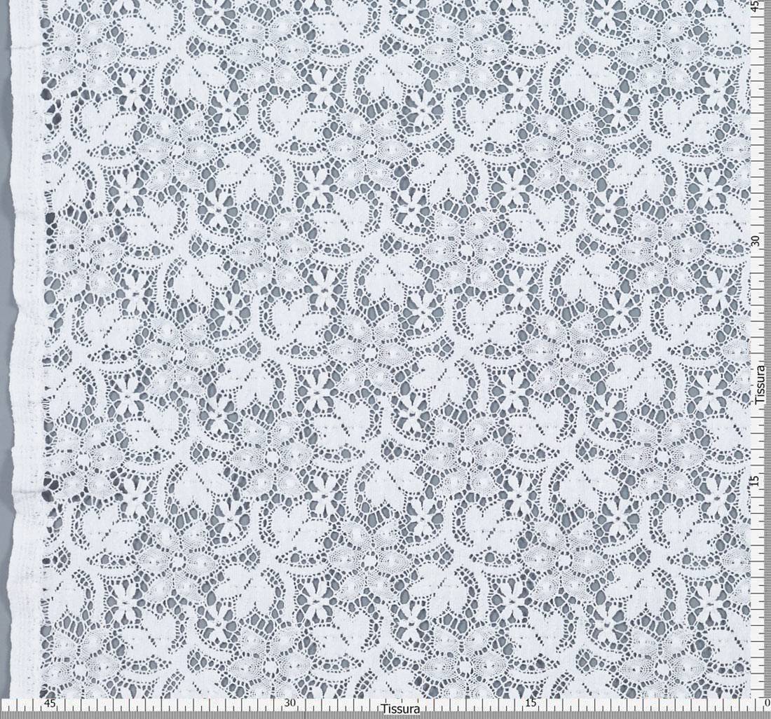 Кружево из хлопка. Растительный узор (стилизованные цветы, ветви, листья). Имитация коклюшечных кружев. Цвет белый в наличии