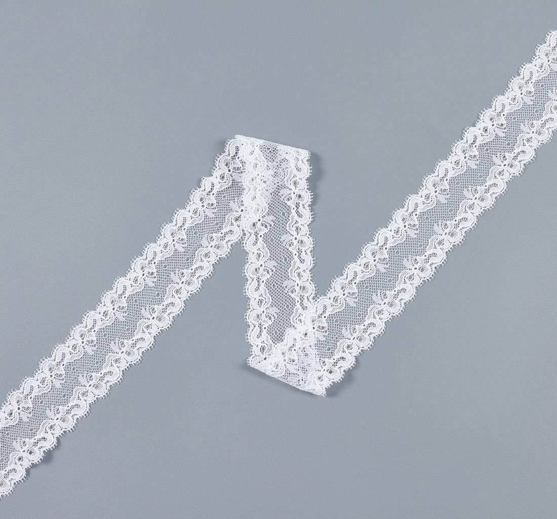 Тесьма эластичная кружевная "шантильи". Фестоны по обеим сторонам. Цвет белый в наличии