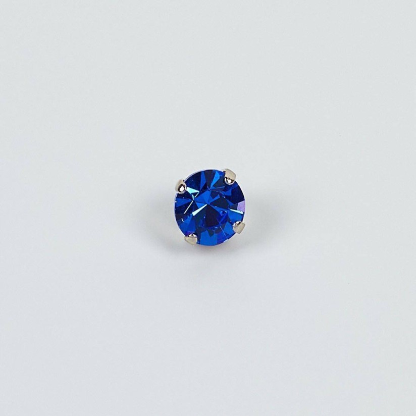 Пуговица металлическая с кристаллом Swarovski синего цвета в наличии