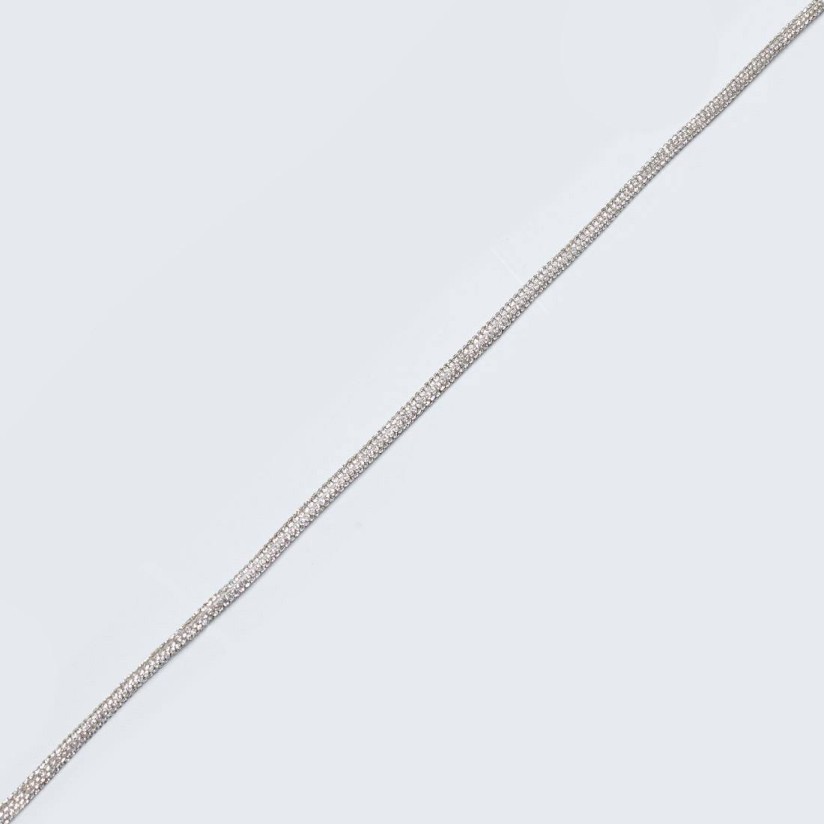 Шнур плетёный, украшенный серебристыми стразами в наличии